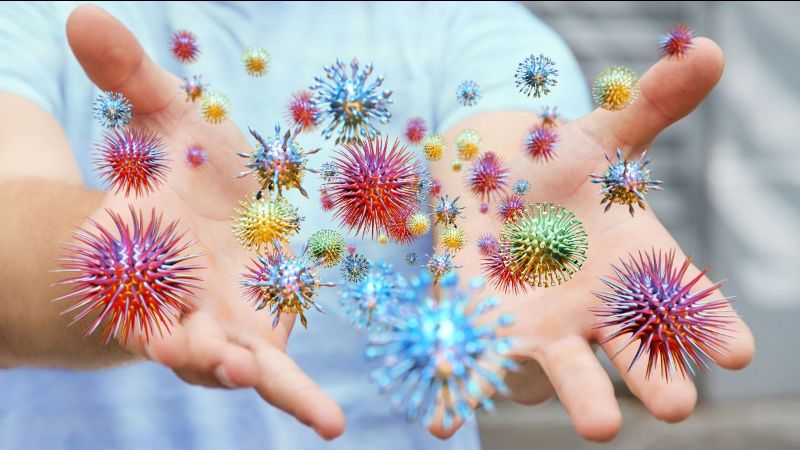 Hands with several viruses.